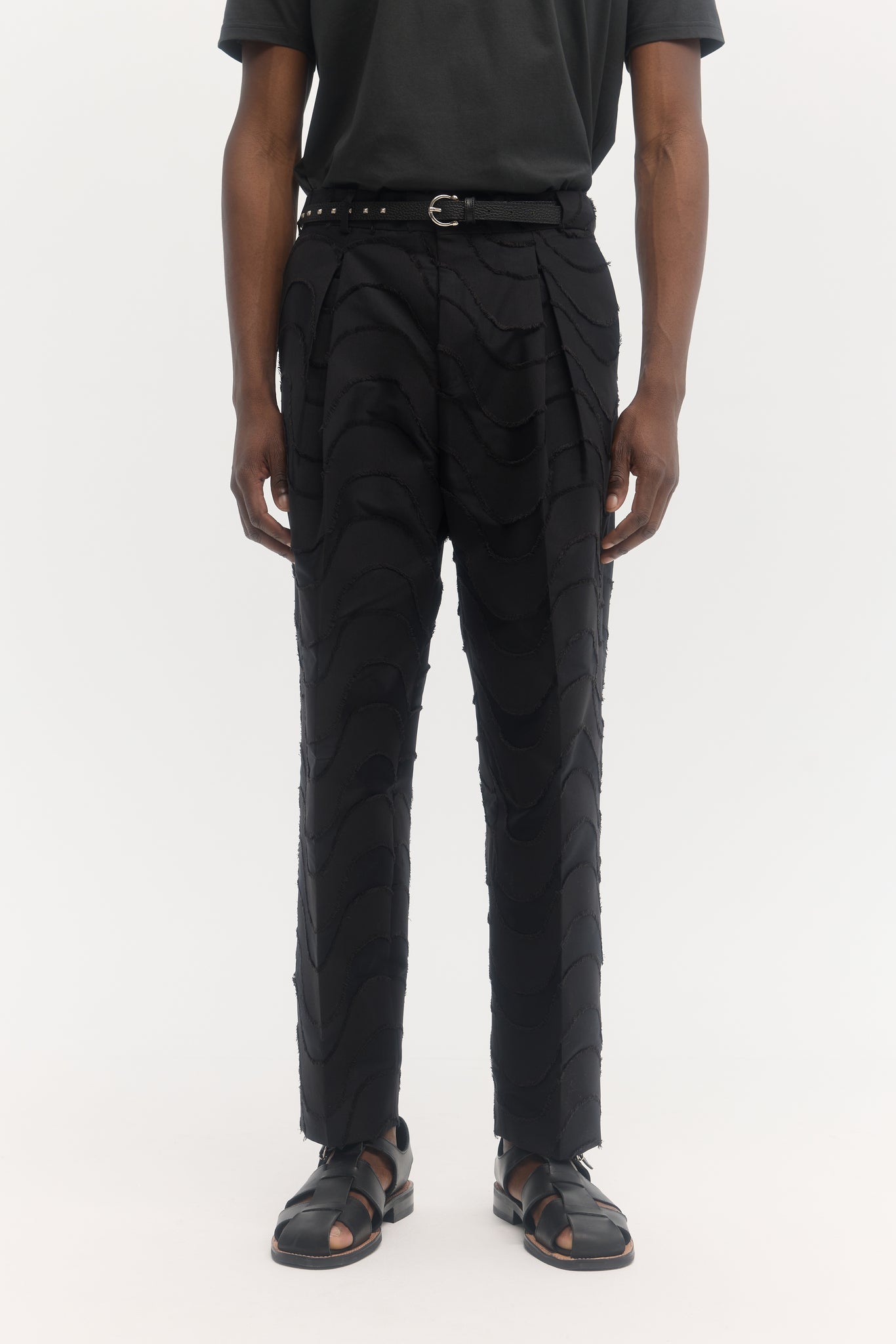 Black wave cut jacquard parachute trousers