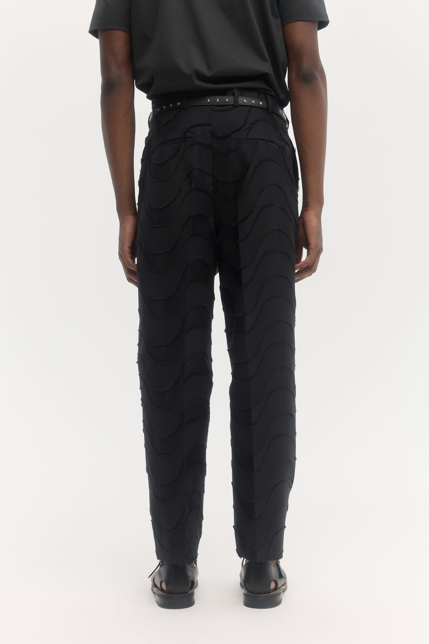 Black wave cut jacquard parachute trousers