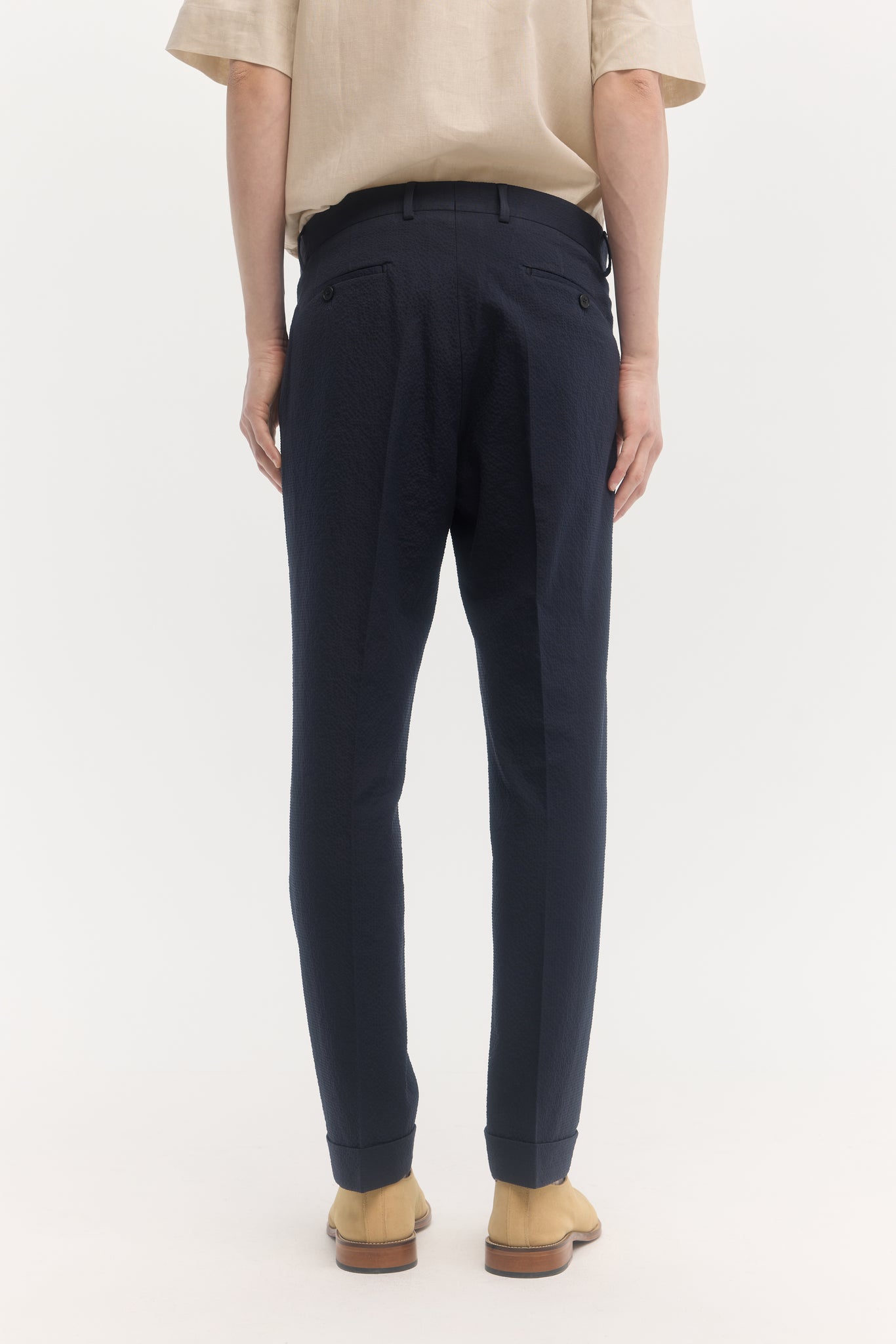 Navy cotton seersucker tapered trousers
