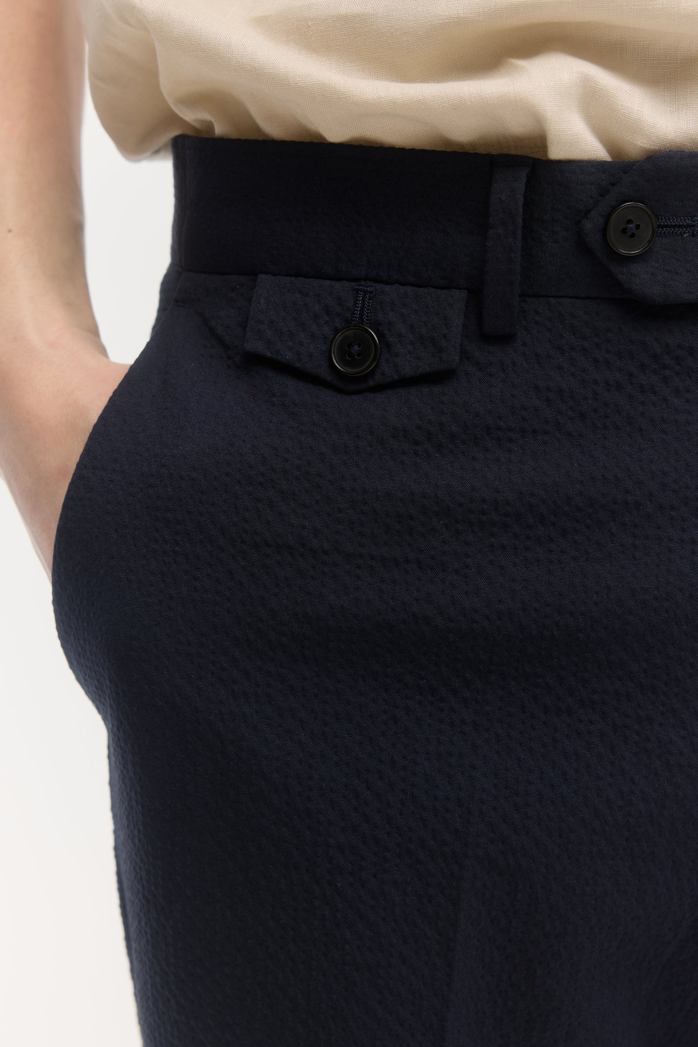 Navy cotton seersucker tapered trousers