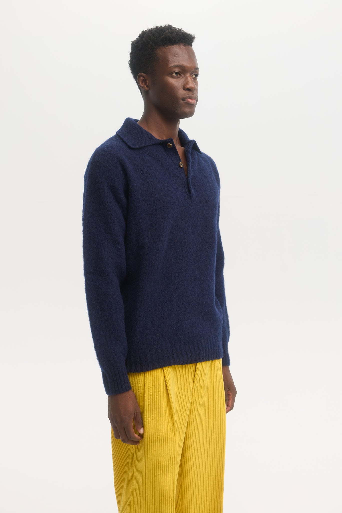 Pull polo en laine shetland brossée marine