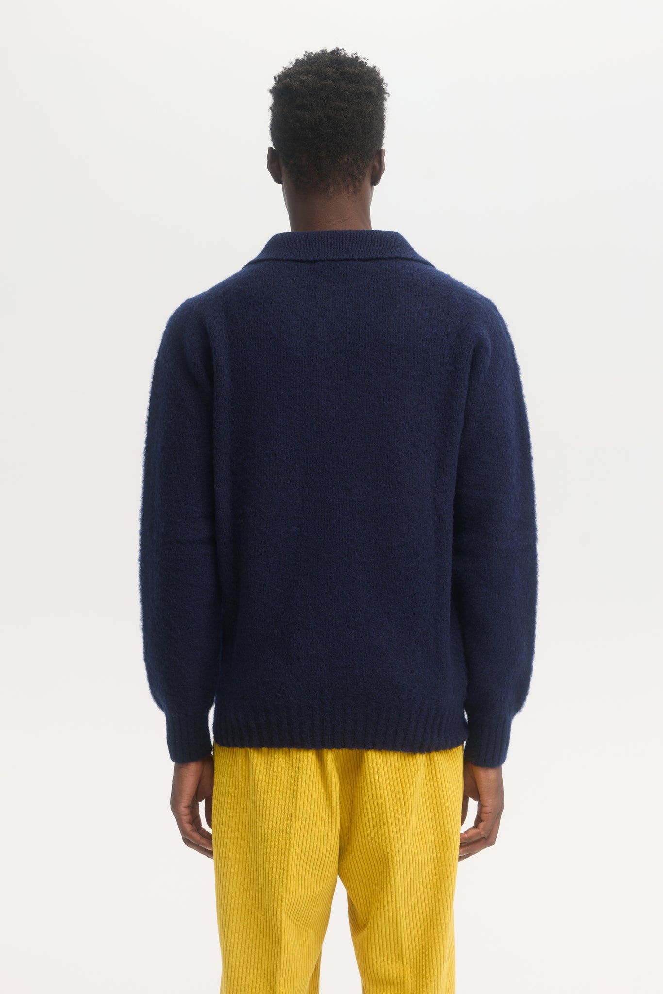 Pull polo en laine shetland brossée marine