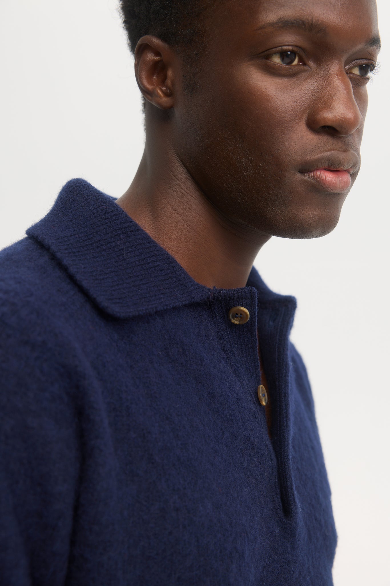 Pull polo en laine shetland brossée marine