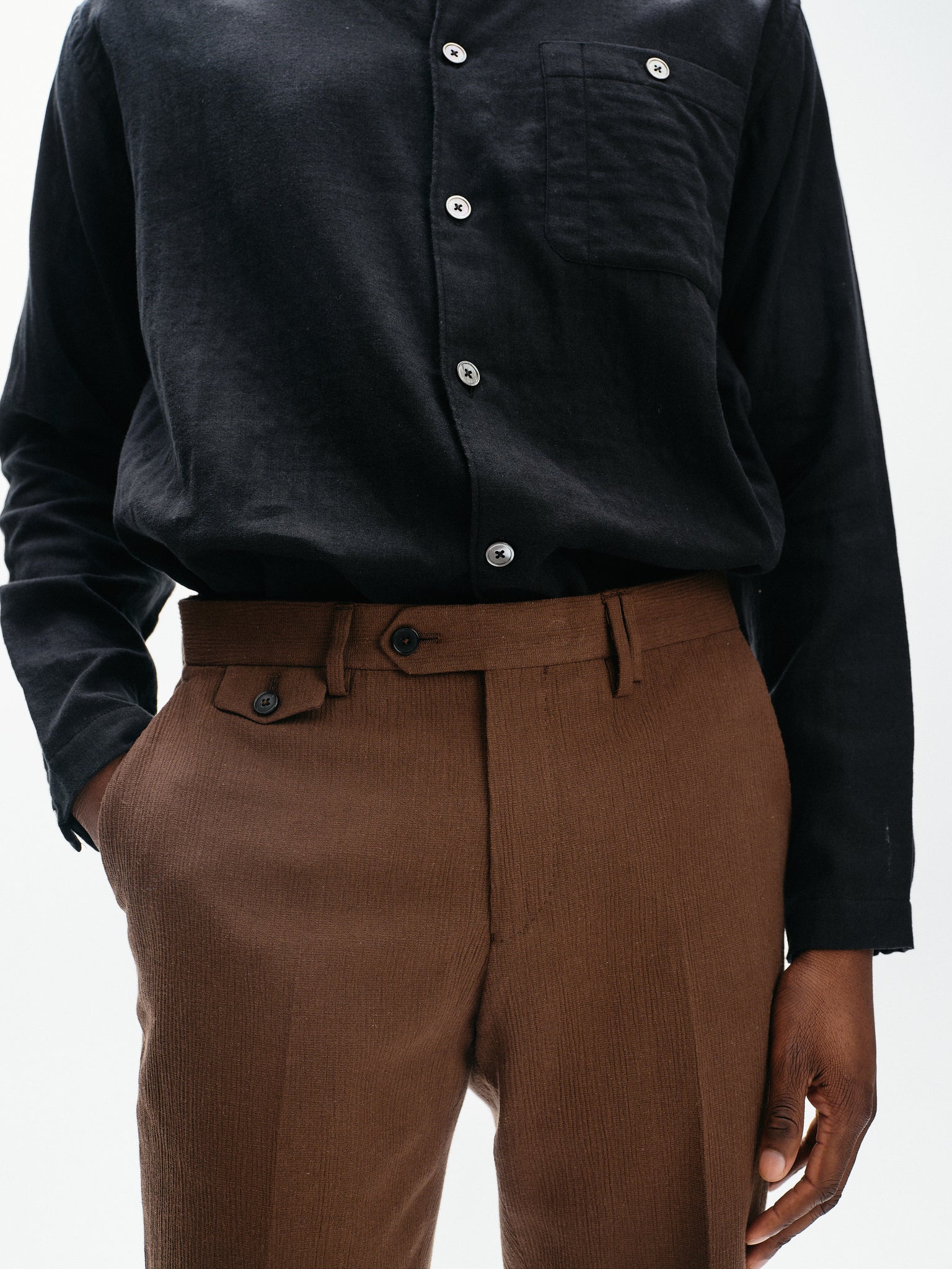 Brown cotton crepe tapered trousers