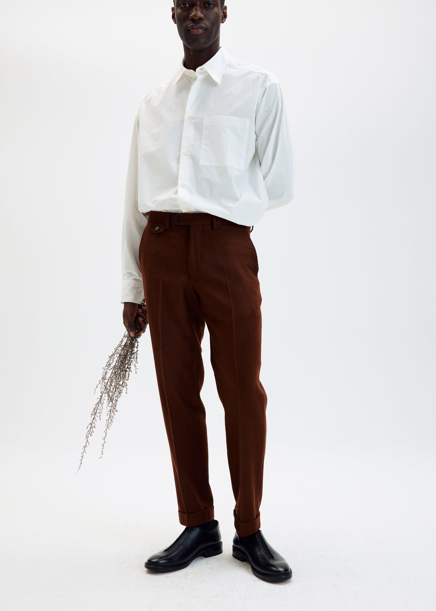 Rust wool flannel tapered trousers